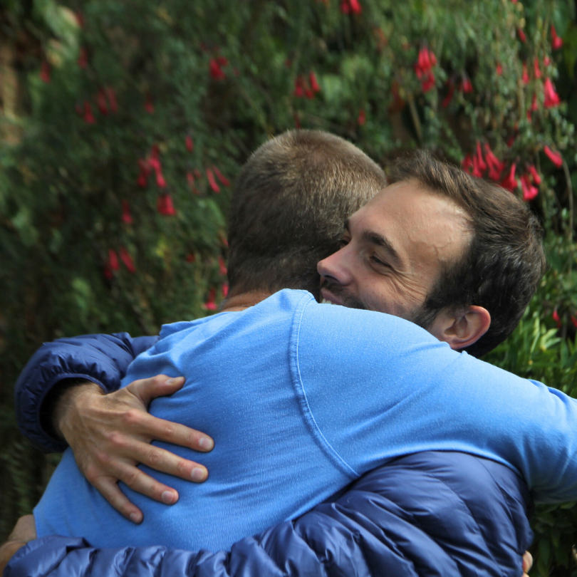 Hamilton Souther hugging a ayahuasca retreat guest